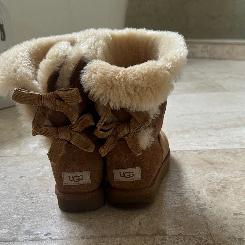 UGG Tan Shearling Boots with Ribbon Accents